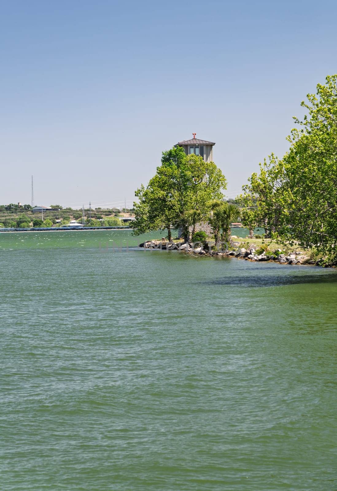 Historic inland lighthouse stands in Horseshoe Bay on LBJ Lake near Marble Falls in East Texas