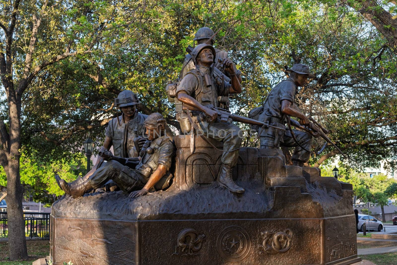 Austin, TX - 10 April 2025: Vietnam Veterans Memorial statue in bronze by State Capitol building in Texas