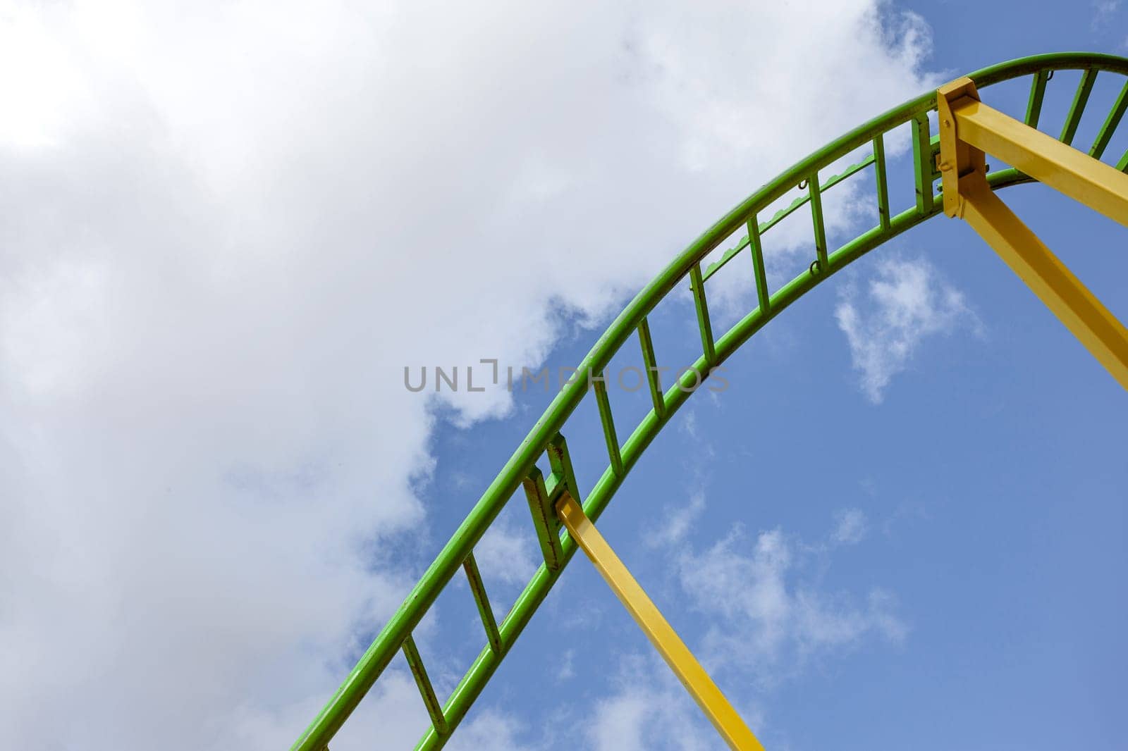 Roller coaster rail and blue sky
