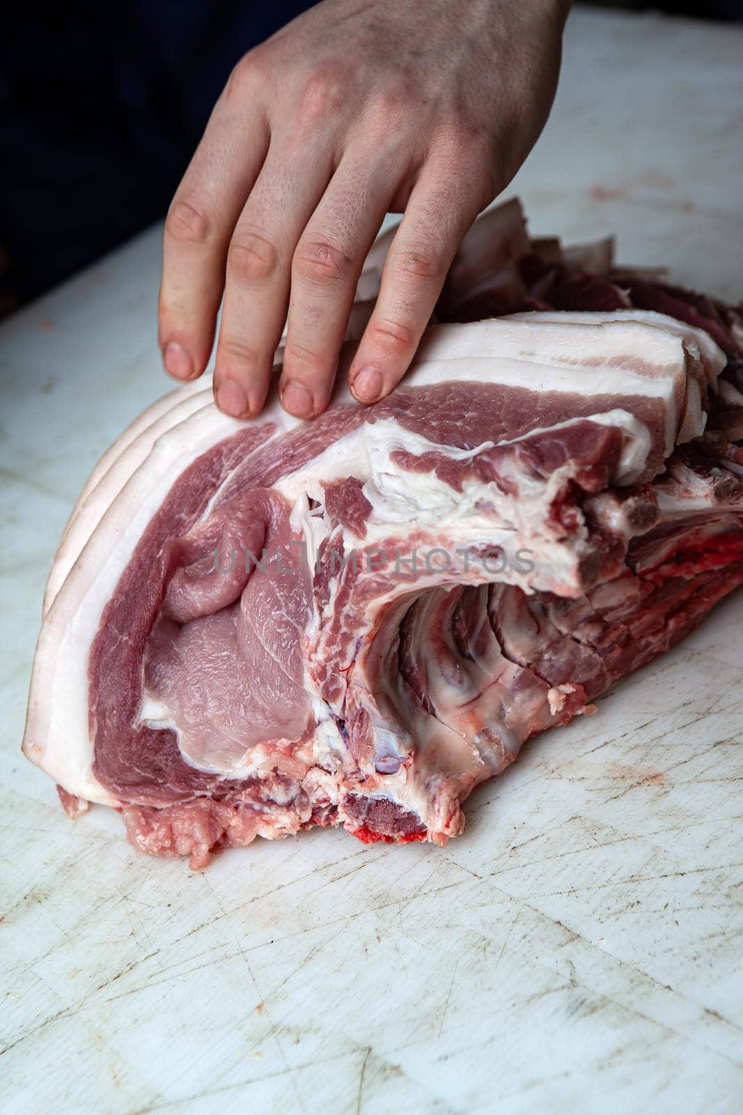 Piece of pork on a butcher block