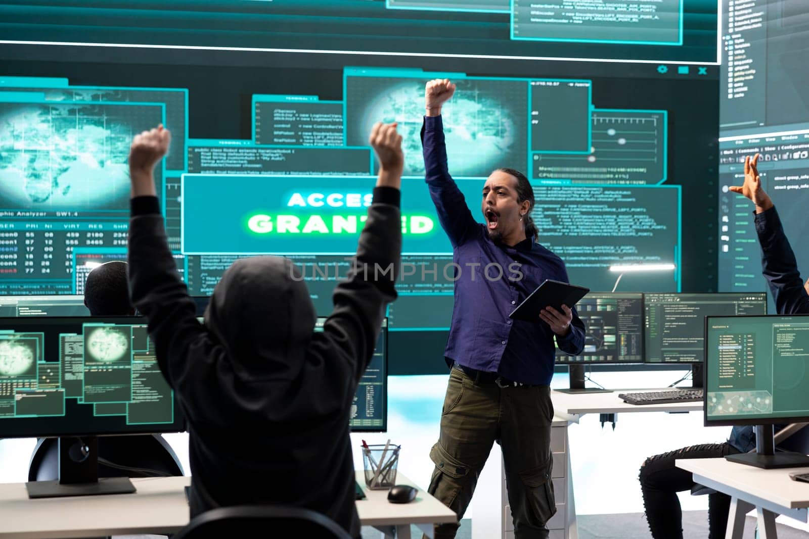 Group of governmental hackers successfully breaking into servers to steal important data, experts feeling happy and proud of their criminal achievement. Espionage system in high tech agency.