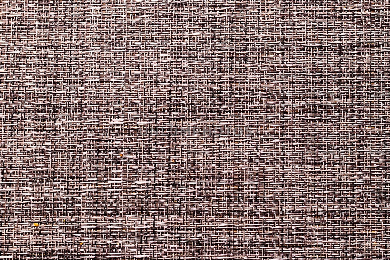 Macro shot woven plastic mat surface