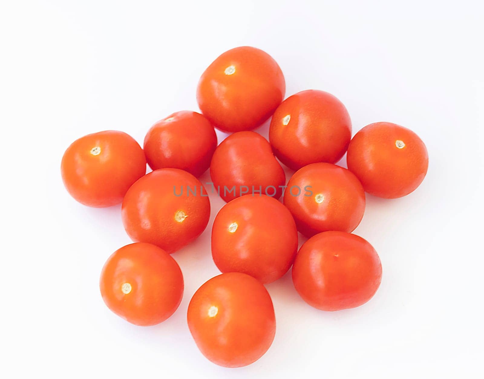 Shot of the cherry tomatoes on the white background