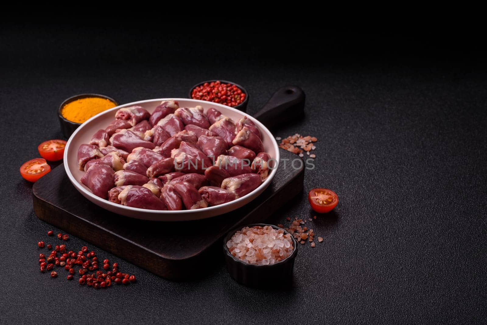 Chicken raw heart, red duck or turkey internal organs as an ingredient for dinner preparation