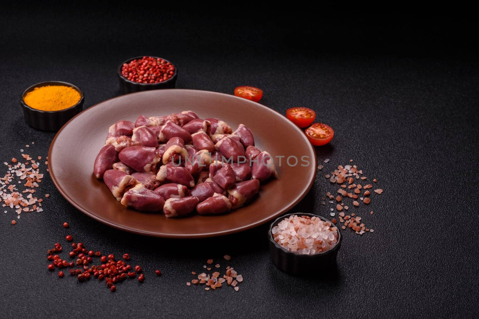 Chicken raw heart, red duck or turkey internal organs as an ingredient for dinner preparation