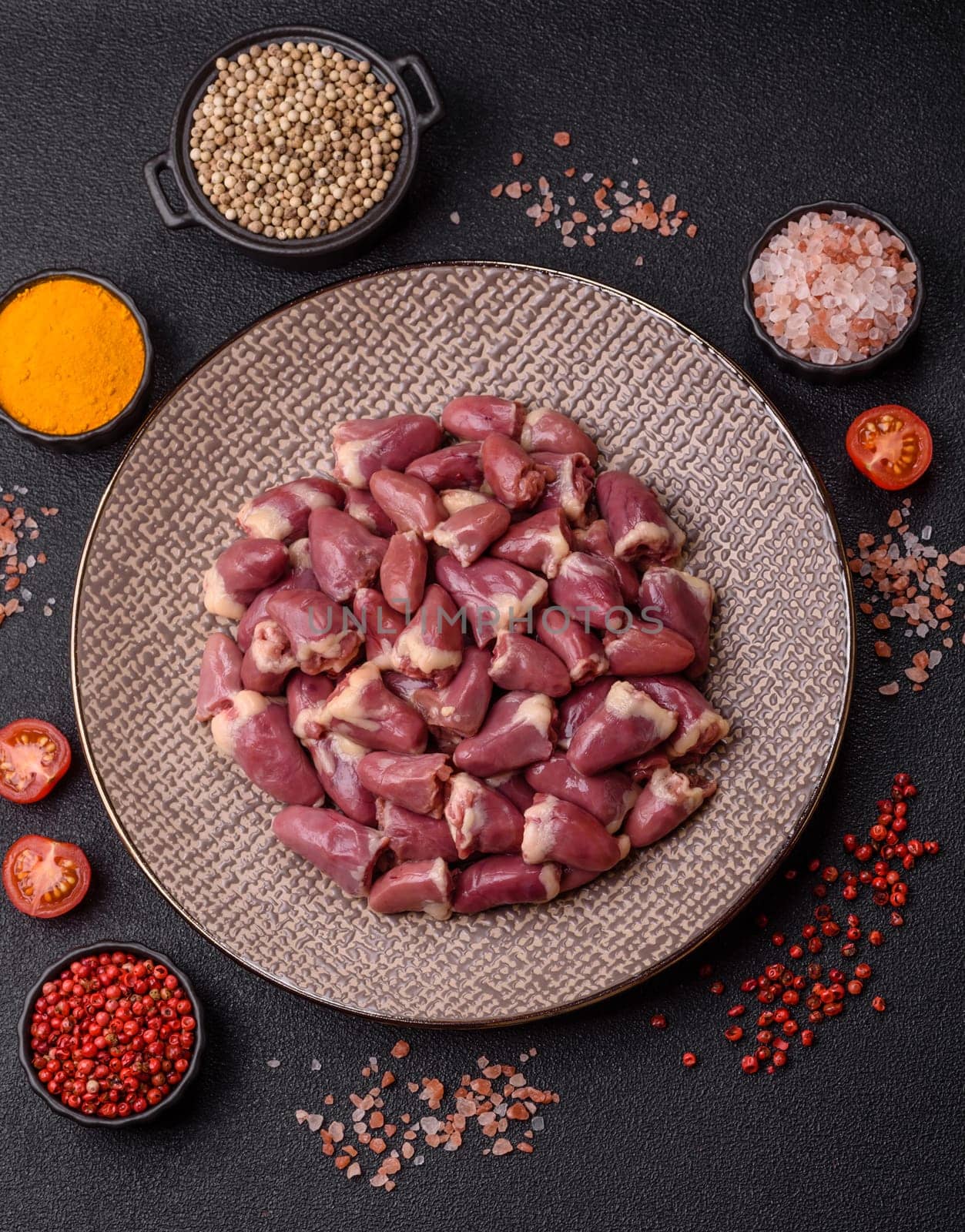 Chicken raw heart, red duck or turkey internal organs as an ingredient for dinner preparation
