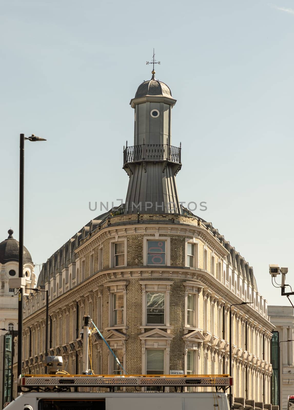 London, UK - Apr 11, 2025 - Lighthouse Building is the lead clad tower at the top of the building on Pentonville Road near London's King Cross railway station. use it as your Wallpaper, Poster and Space for text, Selective focus.