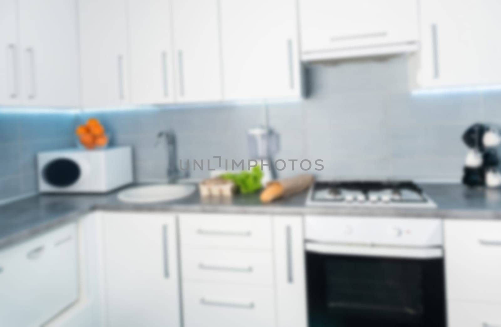 Kitchen Countertop Blurred In A Light, Modern Kitchen, Out Of Focus