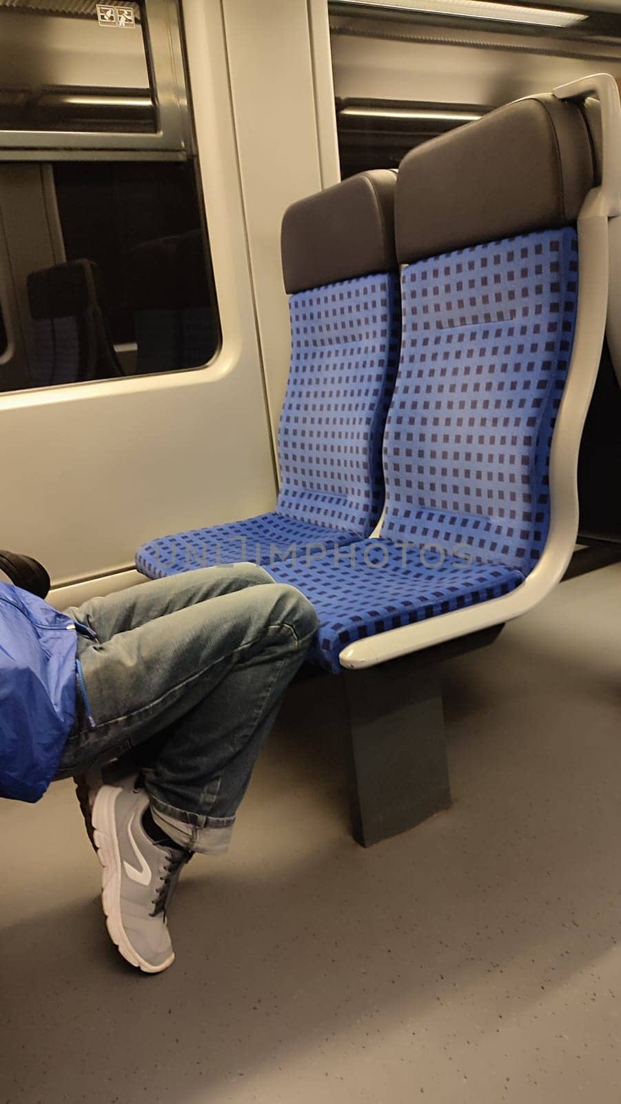 October 17 2024 Bad Schandau Germany Europe Train seat feet men people indoor furniture travel tourism transport shotlisttravel . High quality photo editorial