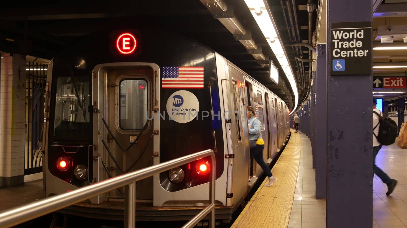 New York, United States - 10 Sept 2023: Subway station, underground metropolitan platform sign. Metro railway passenger public transport. Text signboard World Trade Center. Oculus, Manhattan downtown.