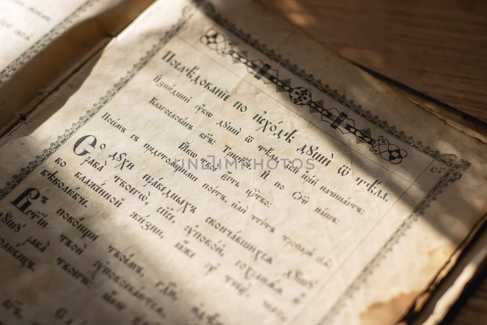 Belarus, Minsk - 09.03.2025: The pages of a book are opened wide, revealing a section filled with intricate Russian handwriting across the paper surface