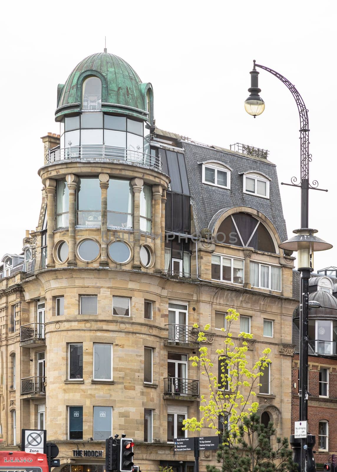 Newcastle, UK - Apr 12, 2025 - Architecture exterior of Baltic chambers an Historic building on the Newcastle quayside with large windows for looking down river in newcastle upon tyne. use it as your Wallpaper, Poster and Copy space, Selective focus.