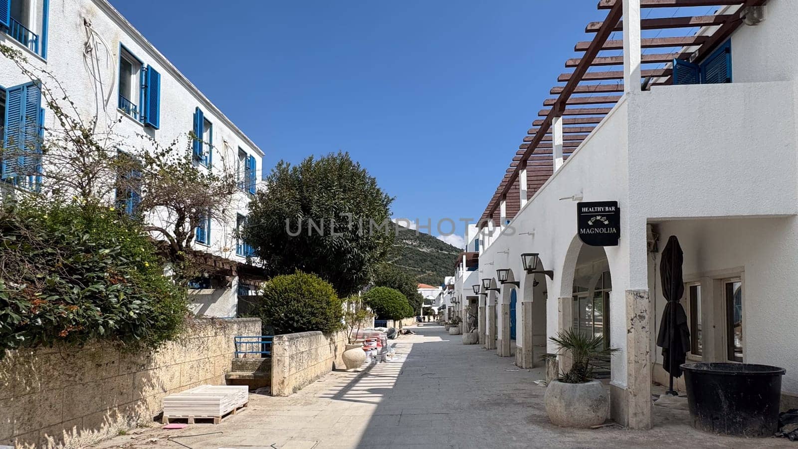 Budva, Montenegro - April 17, 2025: Building materials are lying next to the MAGNOLIA Healthy Bar.repairs and preparation for the tourist season