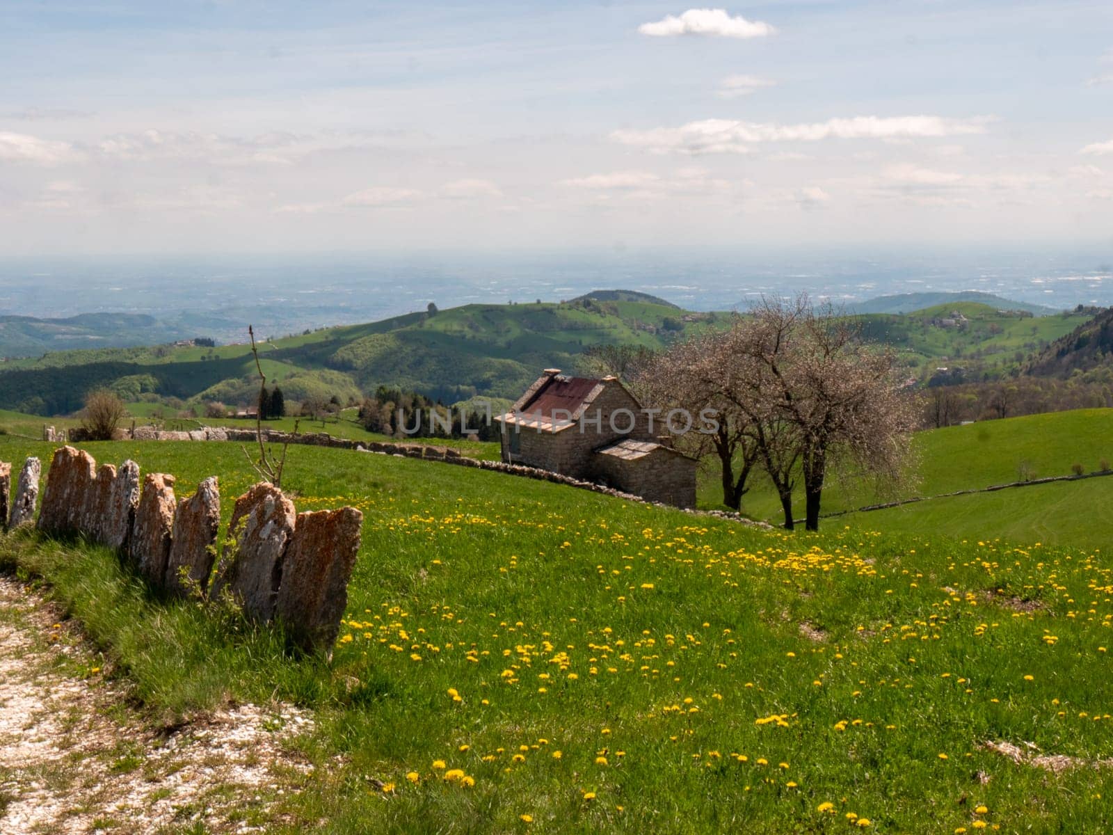 Italian hut in mountain landscape - Mountain Lessini Verona Northern Italy High quality photo