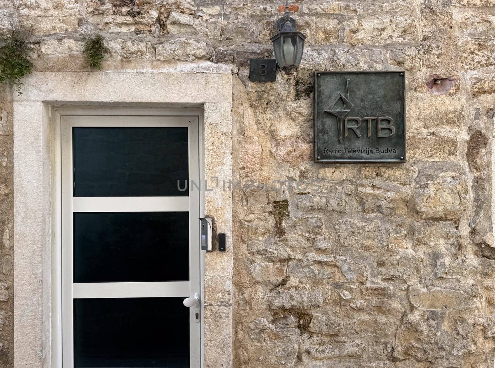 Budva, Montenegro - April 18, 2025: Entrance to the building of Radio Television Budva in the concept of media communications in Montenegro
