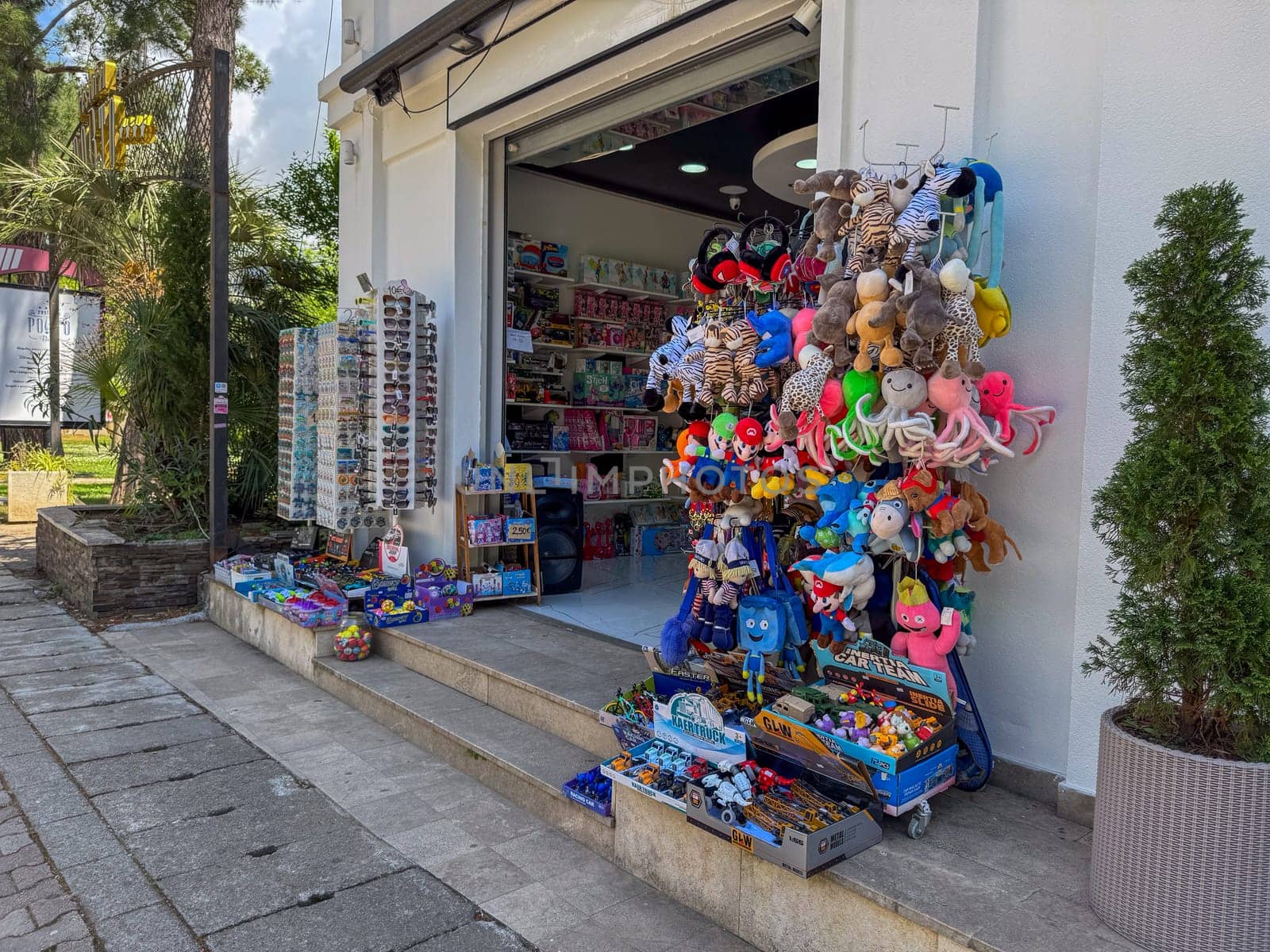 Budva, Montenegro - April 18, 2025: Exterior view of the store with souvenirs and plush toys at the entrance