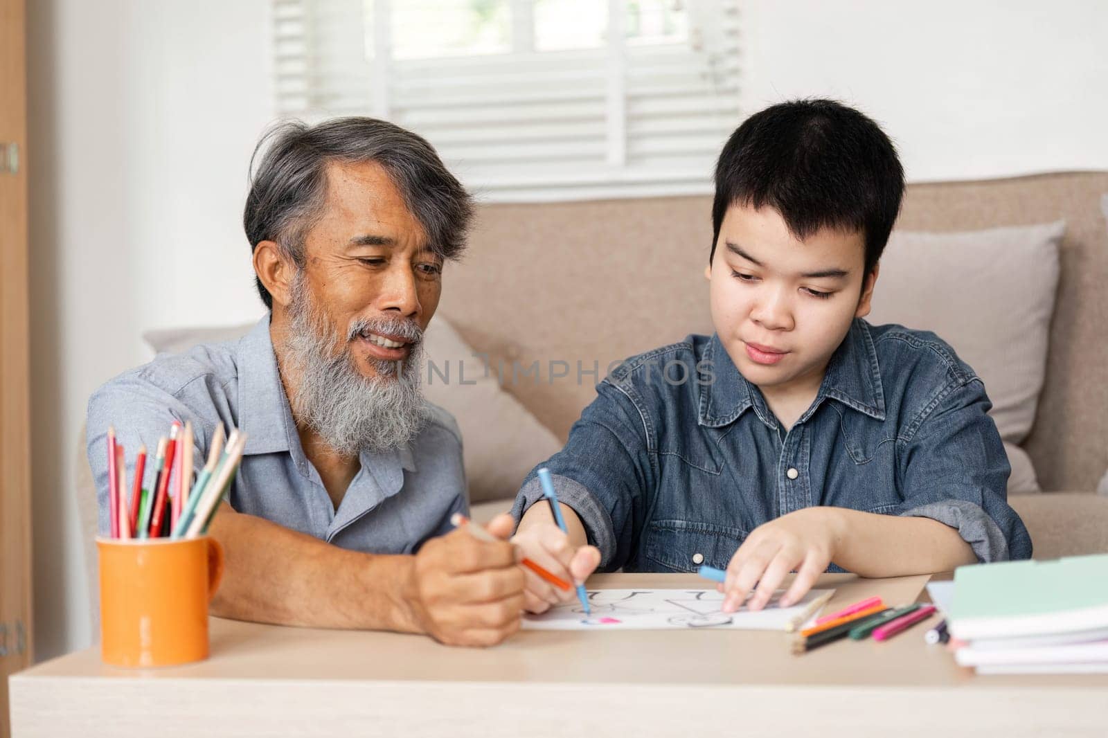 A joyful scene where a grandfather and his grandson engage in art activities, promoting creativity and strengthening their bond through shared experiences.