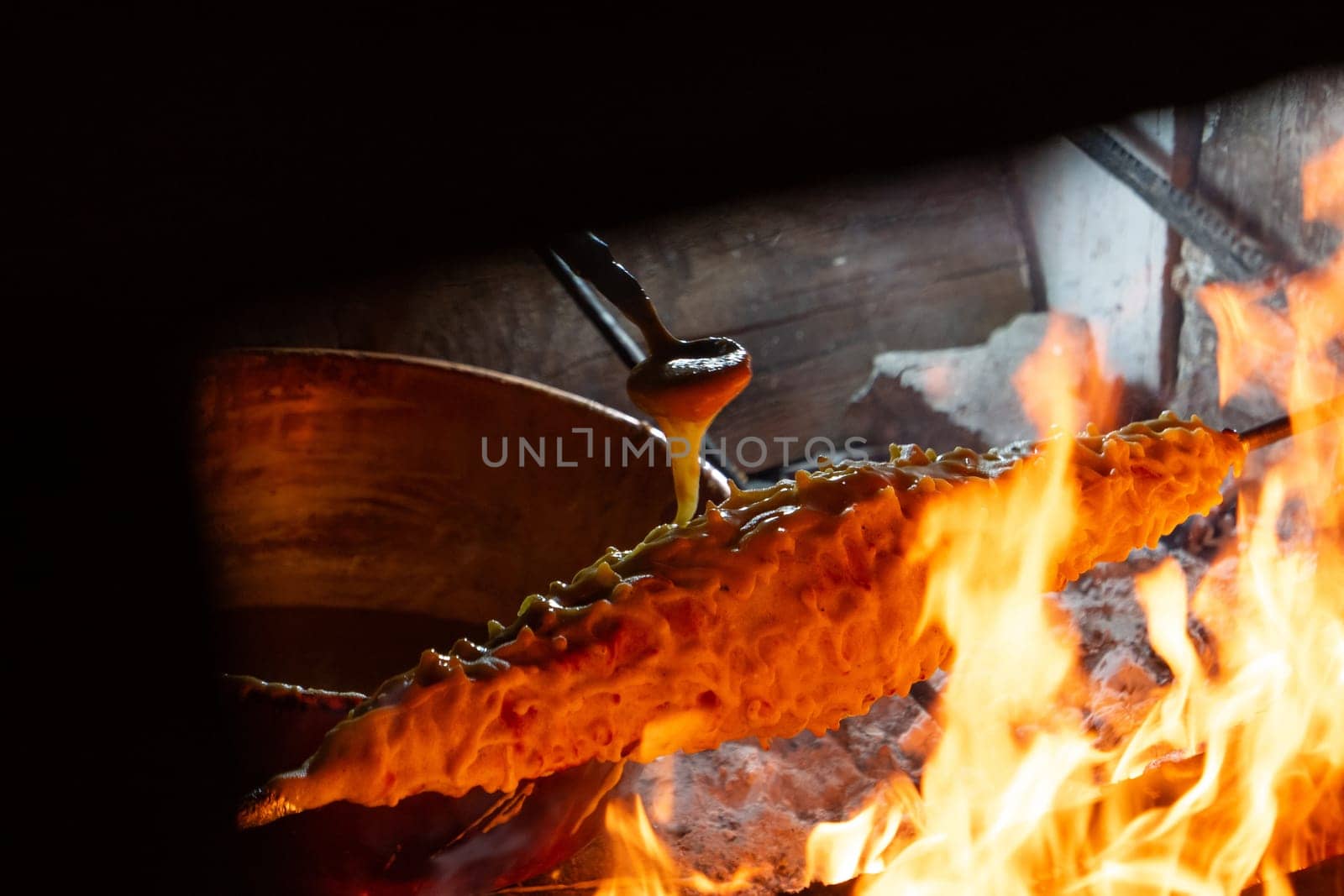 Wood-fired spit-roasted cake, Pyrenees-Atlantique, France. High quality photo