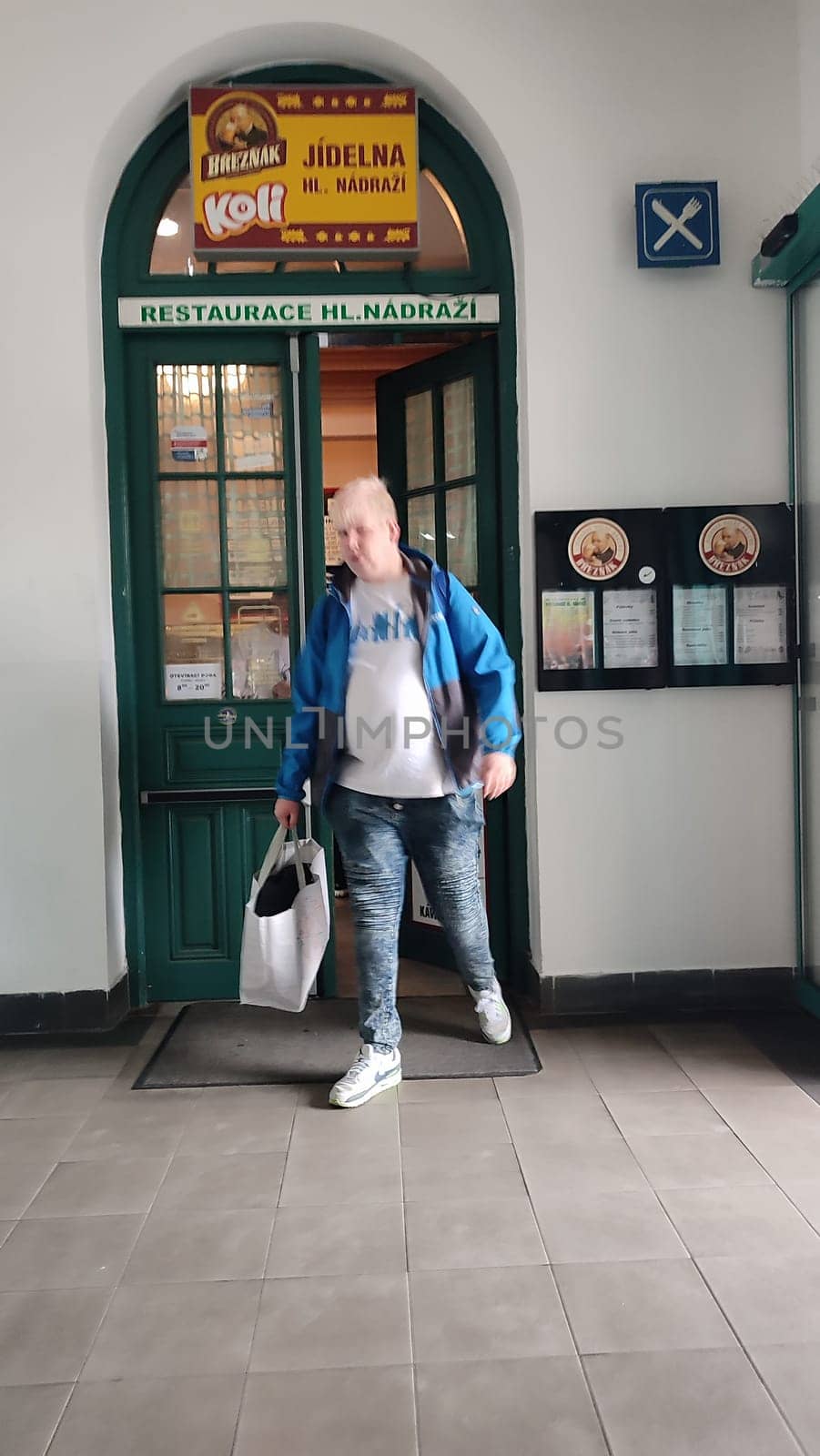 October 18 2024 Liberec Czech Republic Europe,Man exiting restaurant. High quality photo