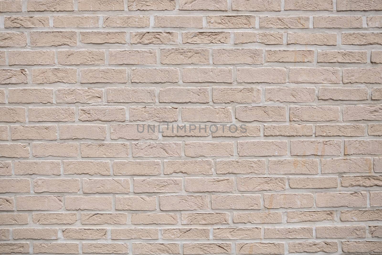 Beige brick wall background grunge texture