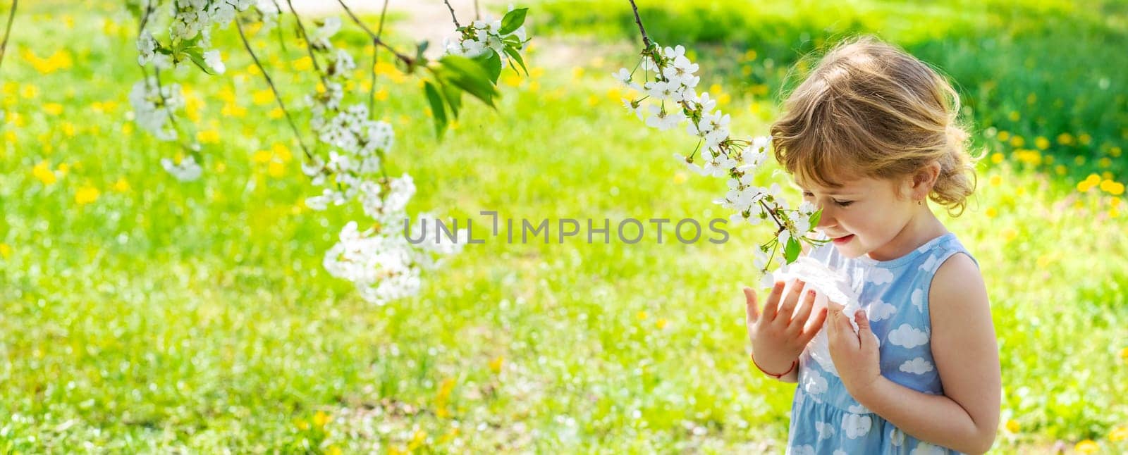 child allergic to flowering trees. Selective focus. kid.