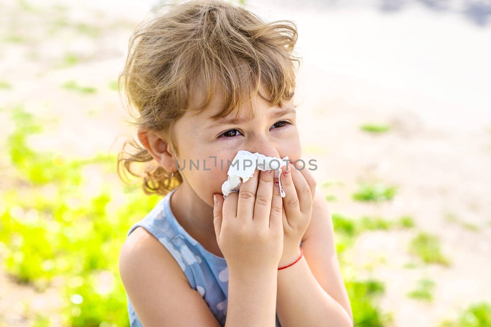 child allergic to flowering trees. Selective focus. kid.