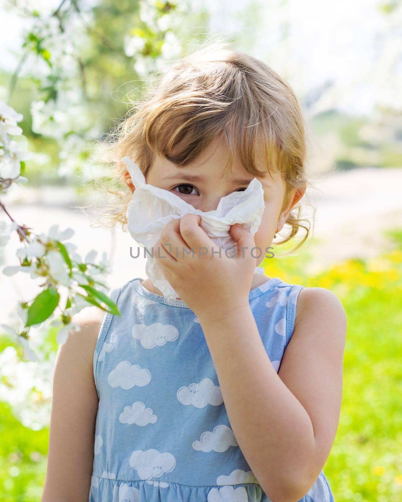 child allergic to flowering trees. Selective focus. kid.