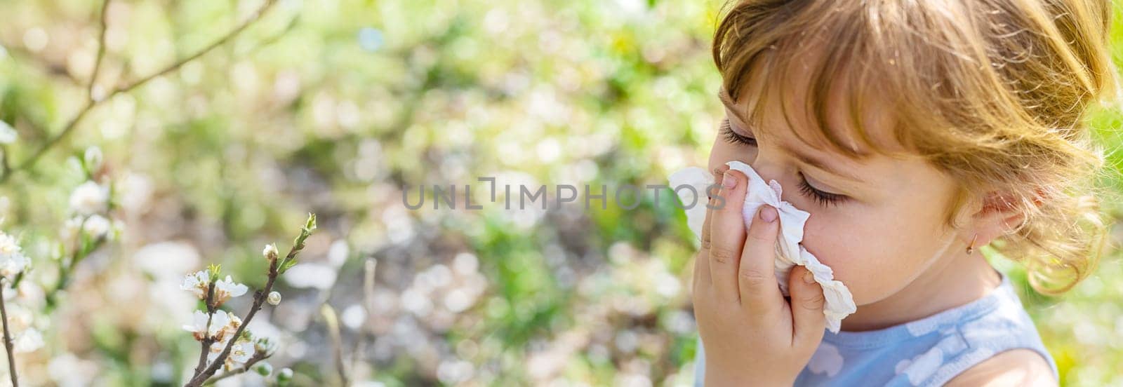 child allergic to flowering trees. Selective focus. kid.