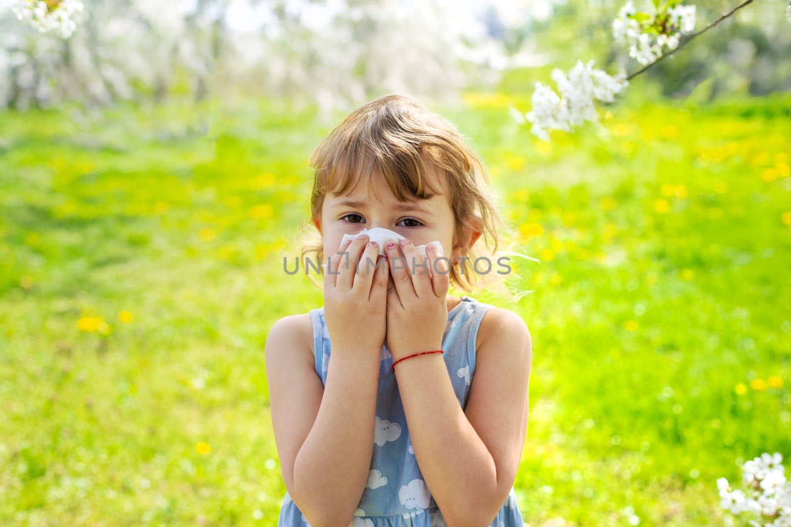 child allergic to flowering trees. Selective focus. kid.
