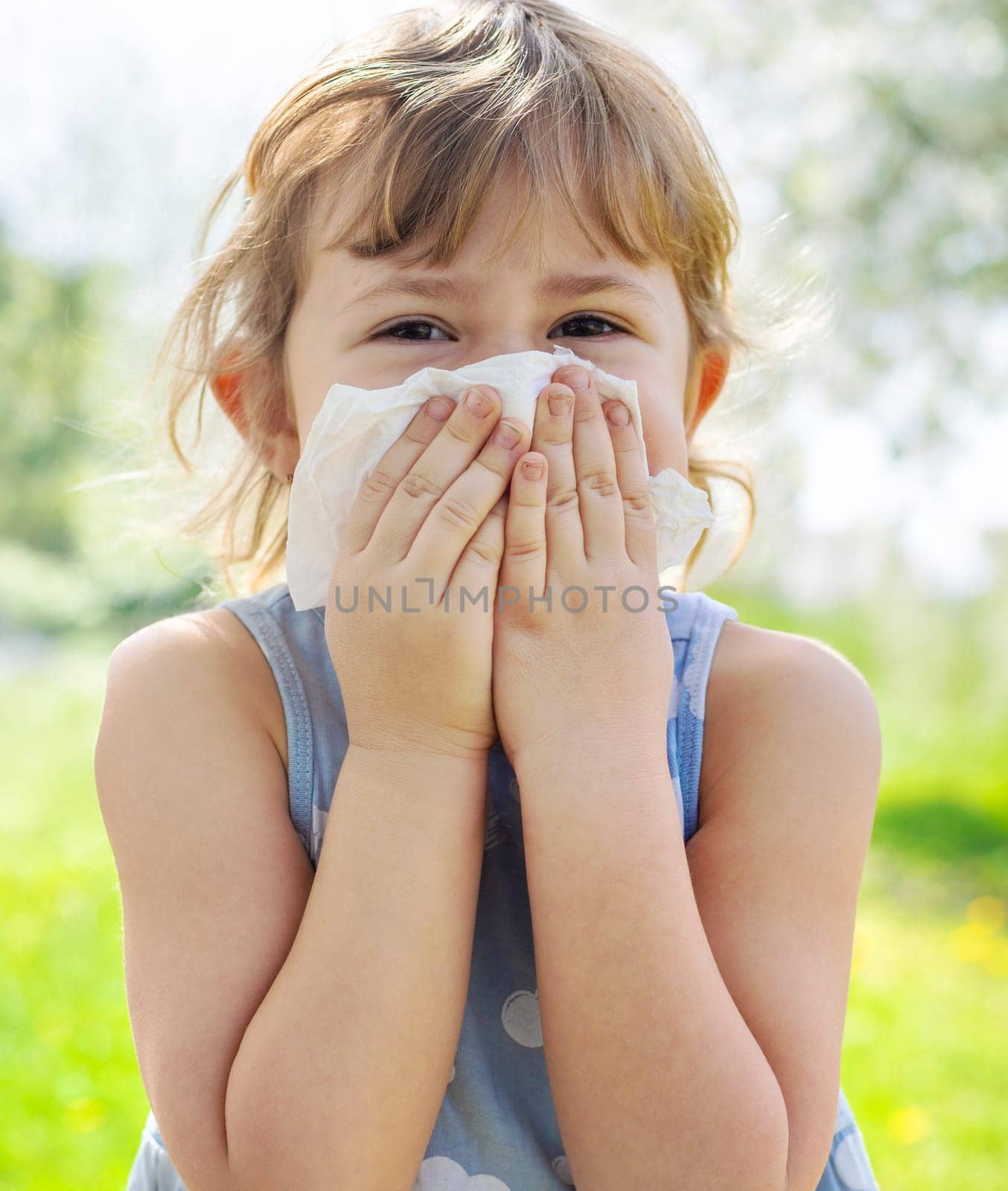 child allergic to flowering trees. Selective focus. kid.