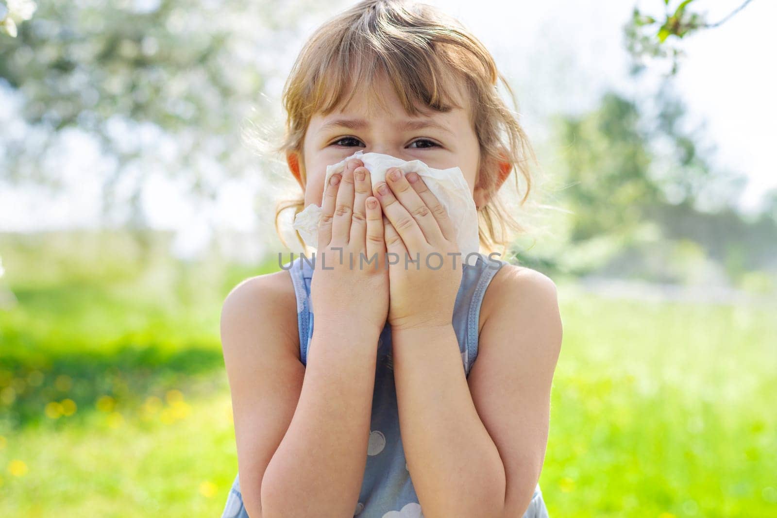 child allergic to flowering trees. Selective focus. kid.