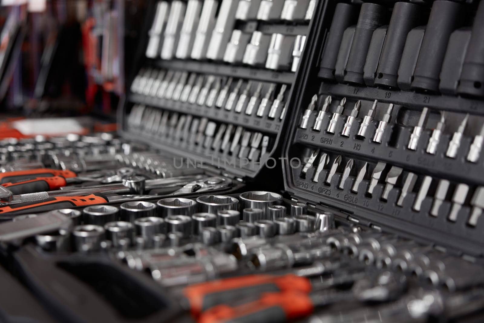 Tool box with kit of wrenches, screwdrivers, spanners and nuts for mechanic service. Hardware store assortment and great choice. Closeup selective focus of repairman instrument