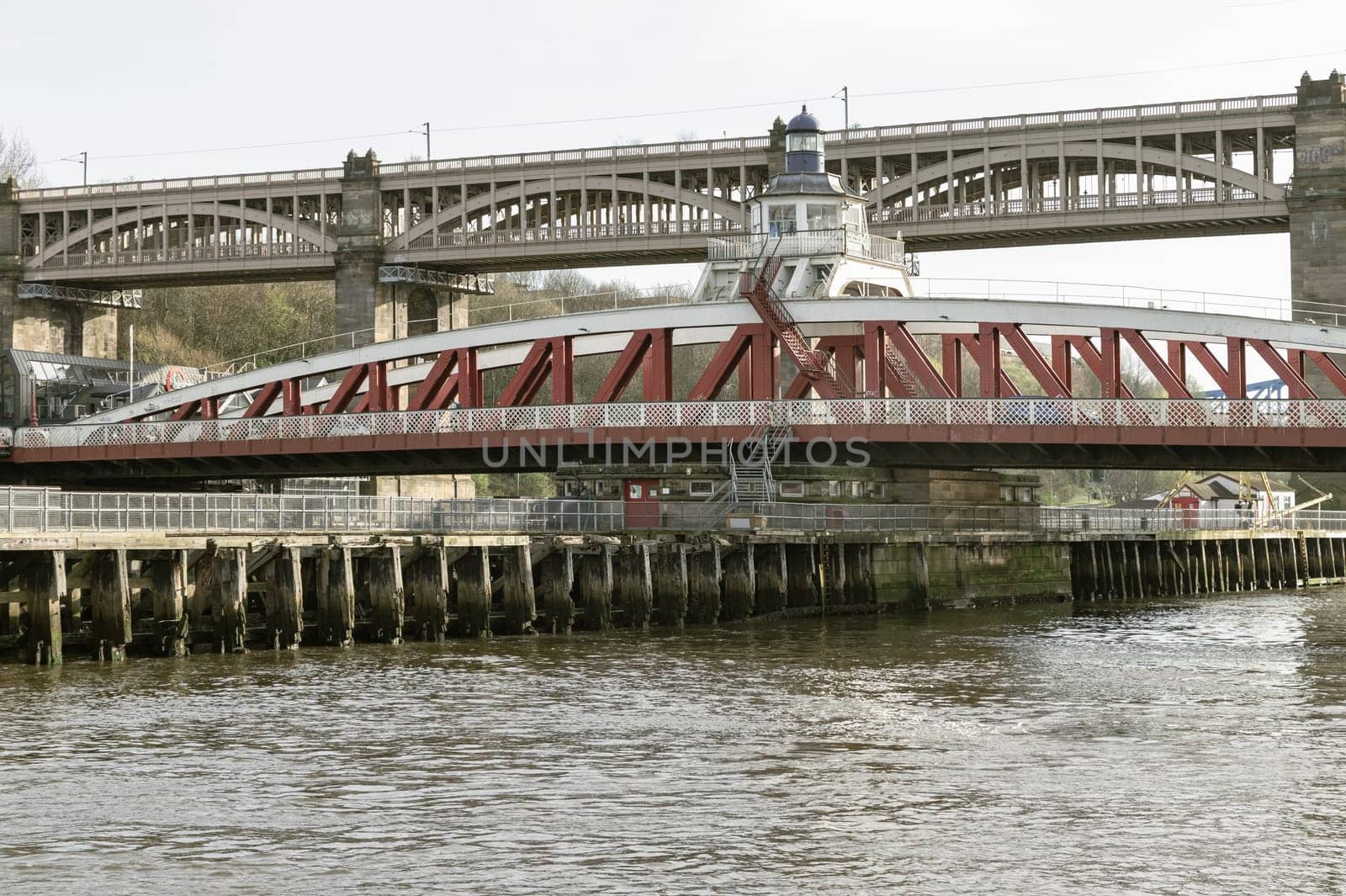 Newcastle, UK - Apr 11, 2025 - Beautiful view of Swing bridge and The High level bridge spanning the River Tyne connecting Newcastle upon tyne and Gateshead in North East England. use it as your Wallpaper, Poster and Space for text, Selective focus.