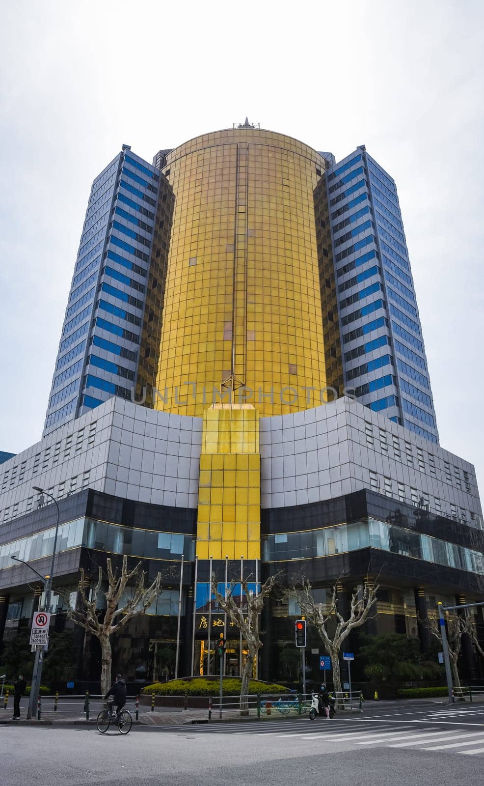 Shanghai, China - 1 April 2025: Modern Fangdi Building office tower at 201 Laoshan West Road, Pudong. Glass-and-steel high-rise with geometric architecture in Shanghai's bustling business district