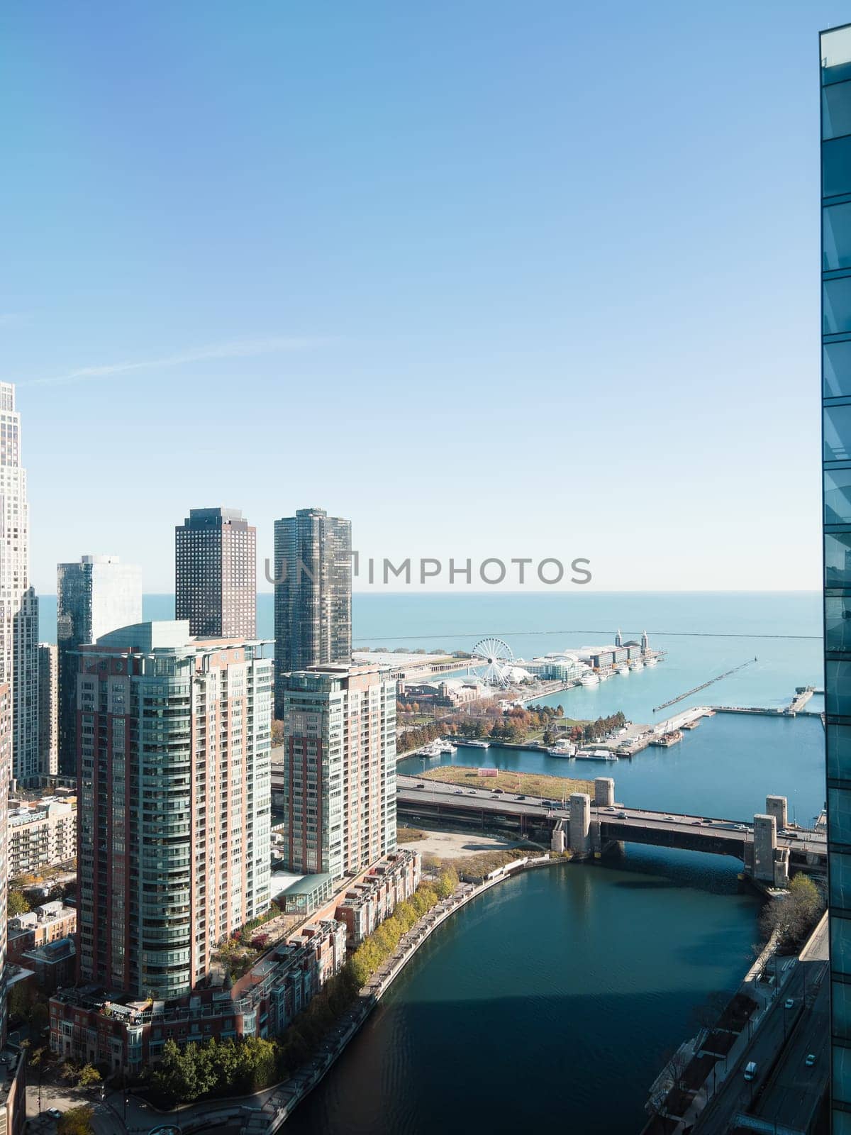 Chicago, Illinois, USA-November 9, 2023-A breathtaking aerial perspective of downtown Chicago, Illinois, captured from a tall building's window.