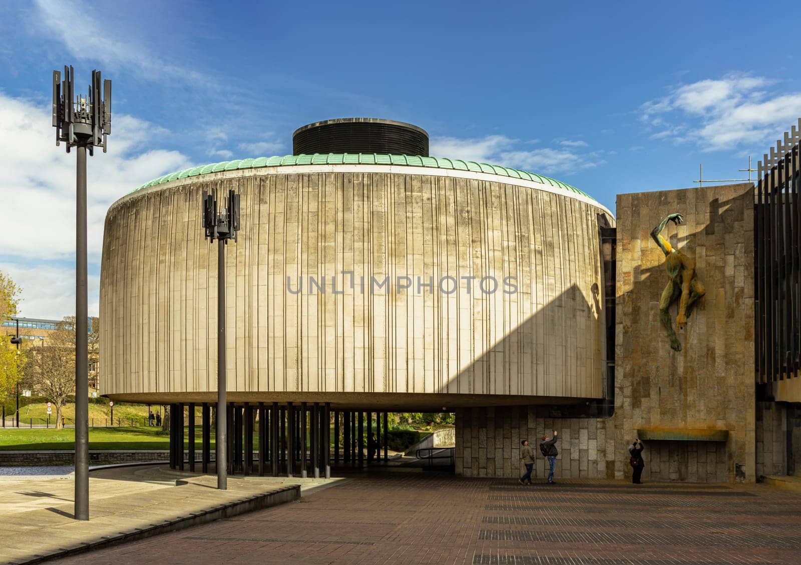 Newcastle, UK - Apr 14, 2025 - Stunning exterior view of council chamber at Newcastle civic centre. Textures and patterns on concrete rotunda cladding of historic building, use it as your Wallpaper, Poster and Copy space, Selective focus.