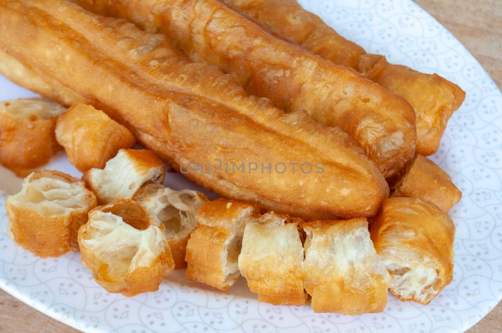 Top view of delicious cakoi or youtiao cake. Asian food concept.