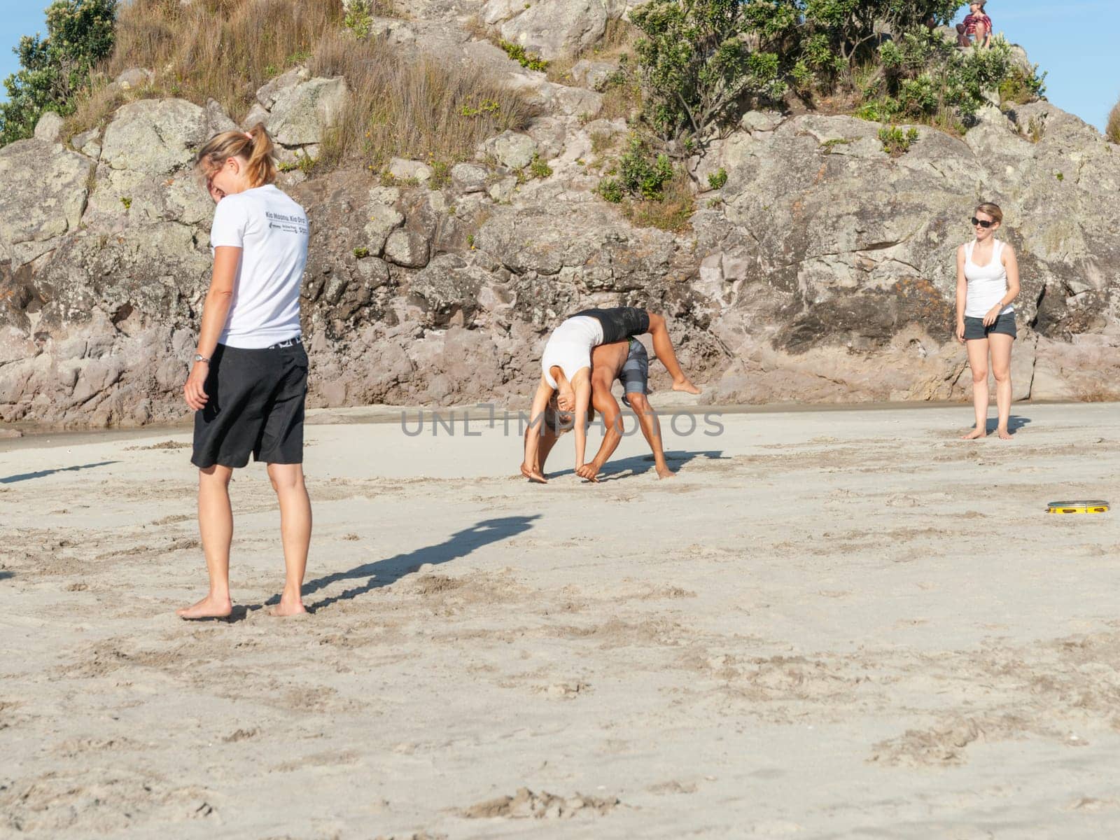 Mount Maunganui New Zealand - January 23 2012; Group of young adults partaking in Afro-Brazilian martial art of capoeira.