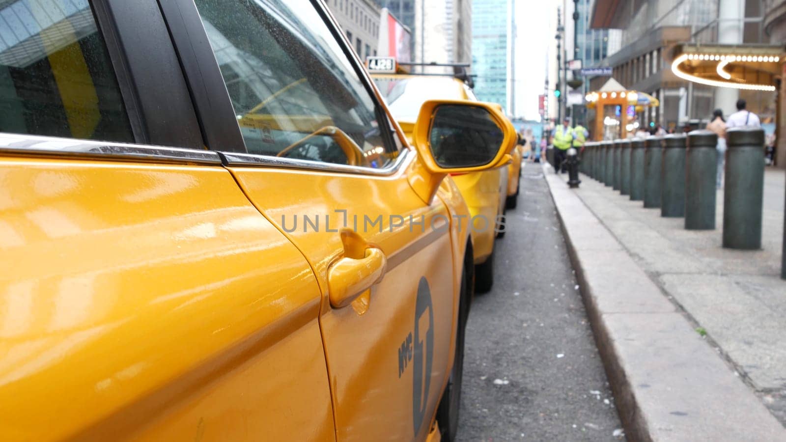 New York City, United States - 4 Sept 2023: Grand Central Terminal railway station, 42 street. Manhattan Midtown. Yellow taxi cab, cars on Pershing Square, USA. American urban road traffic and people.