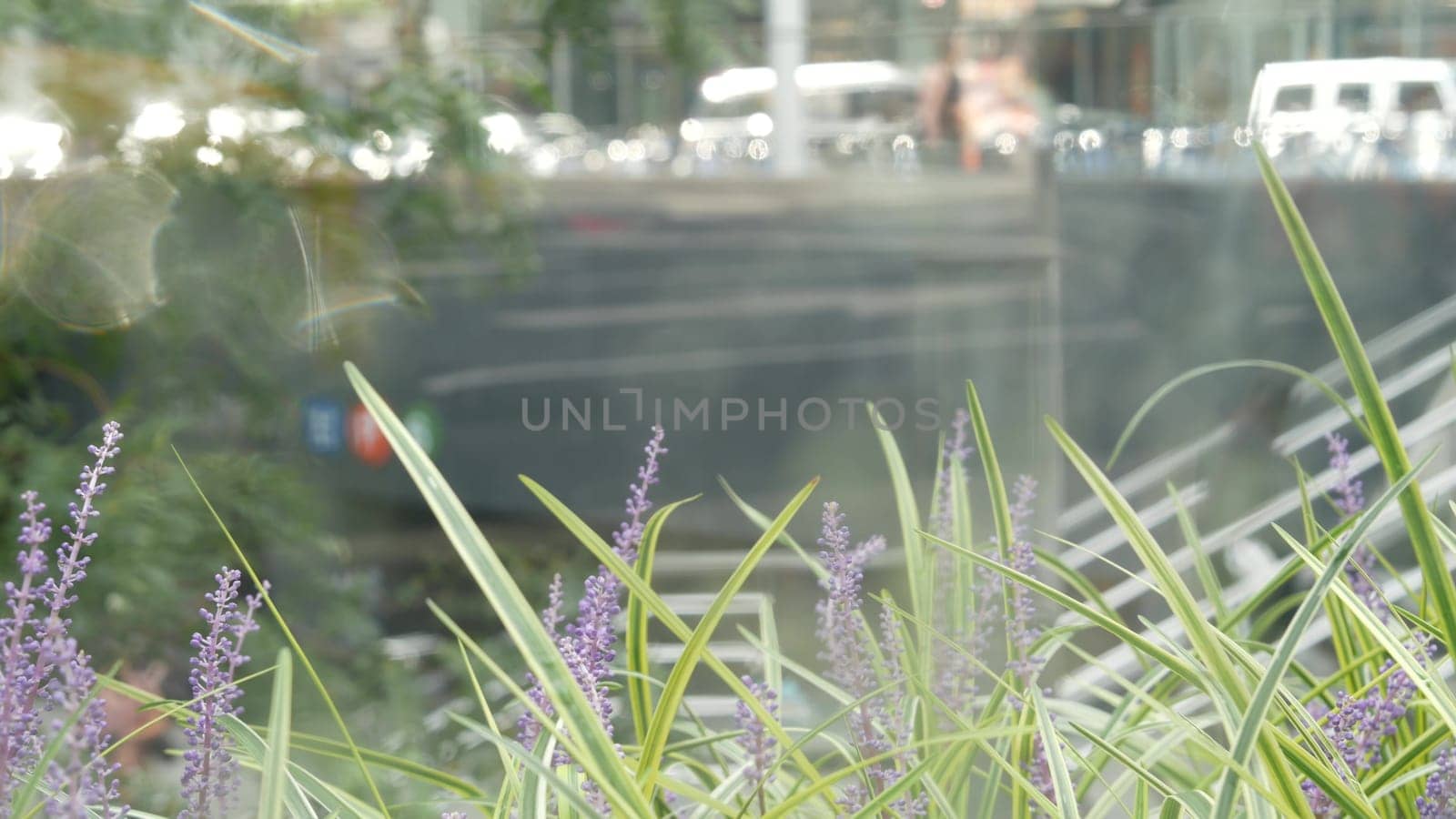 New York City, United States - 11 Sept 2023: Manhattan Midtown Lexington avenue, United States. Defocused people pedestrian, underground metro subway station, stairs on 53 street, urban USA. Greenery.