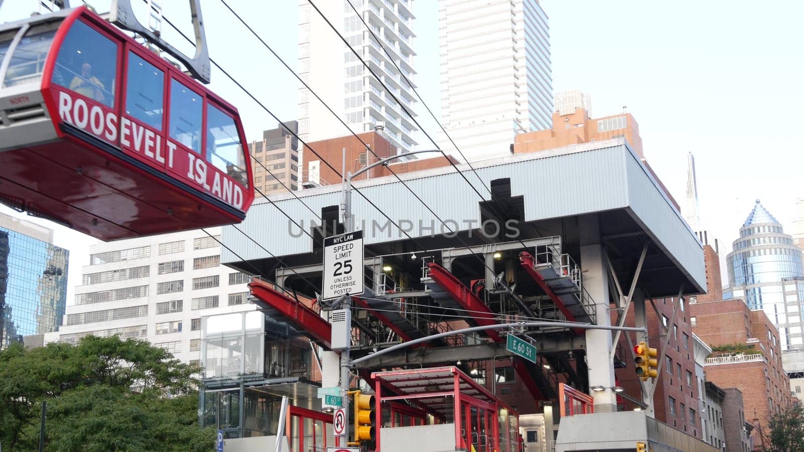 New York City, United States - 15 Sept 2023: Roosevelt Island tramway to Manhattan Midtown. American aerial cable tram near Queensboro Bridge. Urban public transportation, passenger transport in USA.