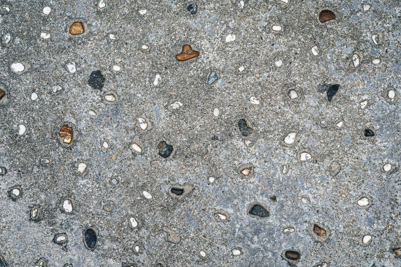 grey background with asphalt texture with sidewalk stones