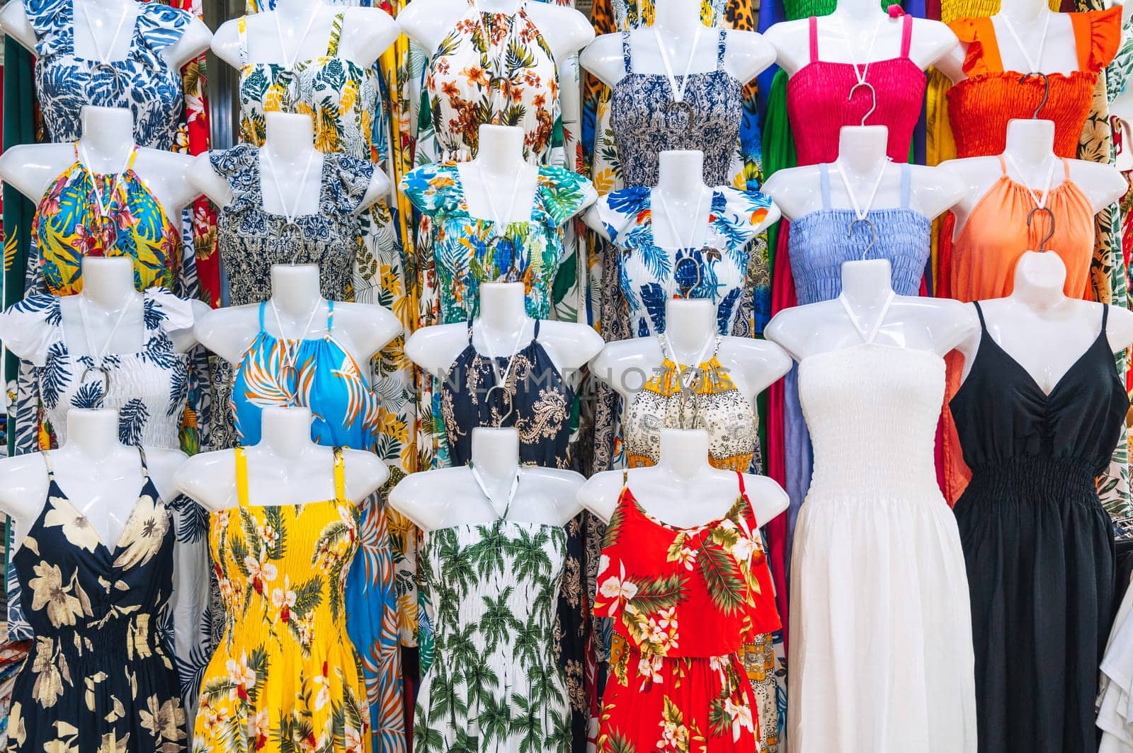 female summer dresses on mannequins on the market in Asia shop