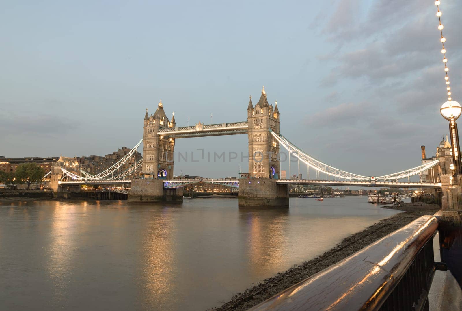 London, UK - Apr 27, 2025 - Sunset view of The Iconic Tower Bridge with sky in the background. Famous Tower Bridge is Bascule bridge in London city, use it as your Wallpaper, Poster and Space for text, Selective focus.