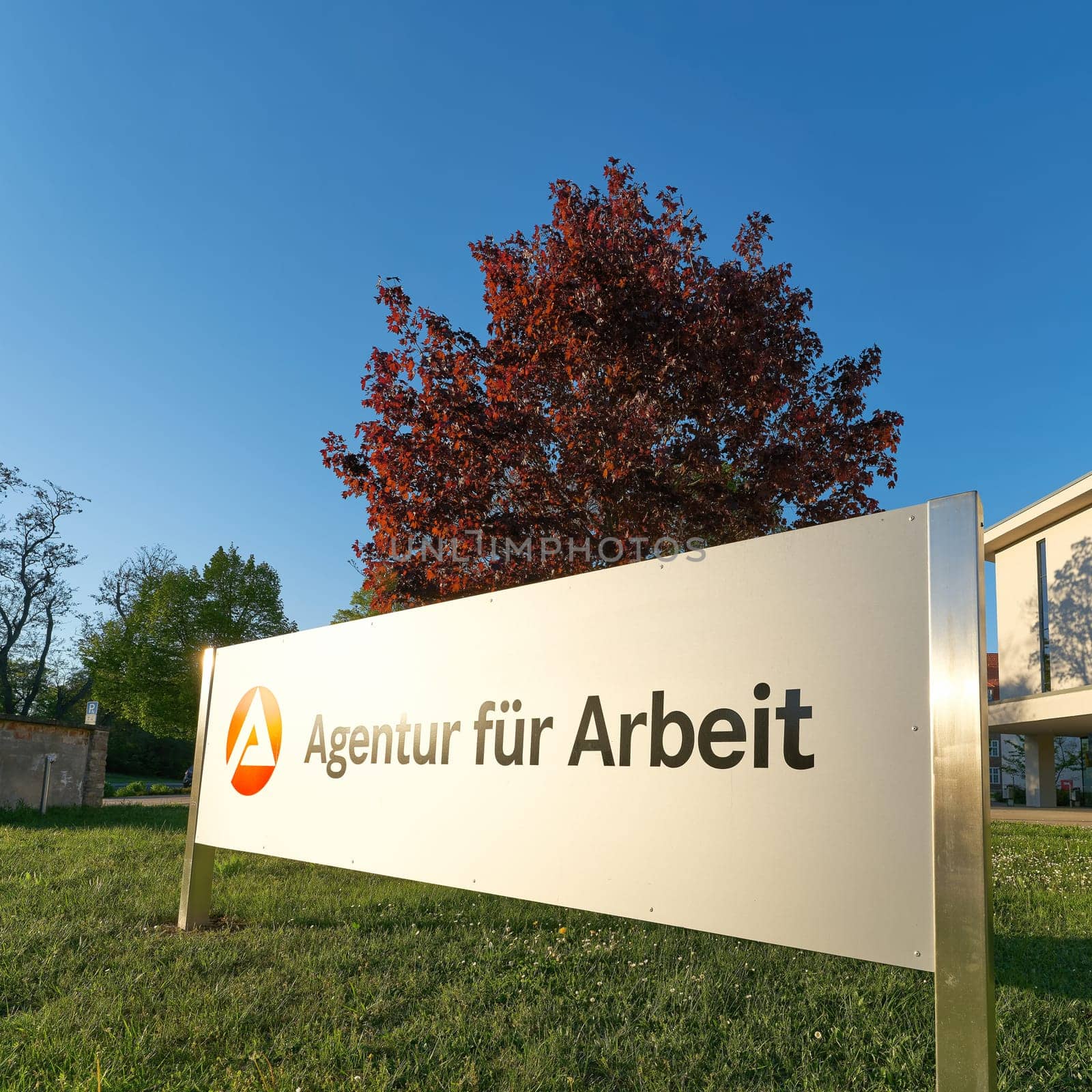 Magdeburg, Germany – April 26, 2025: Sign with the german inscription Agentur für Arbeit, employment agency in Magdeburg in Germany