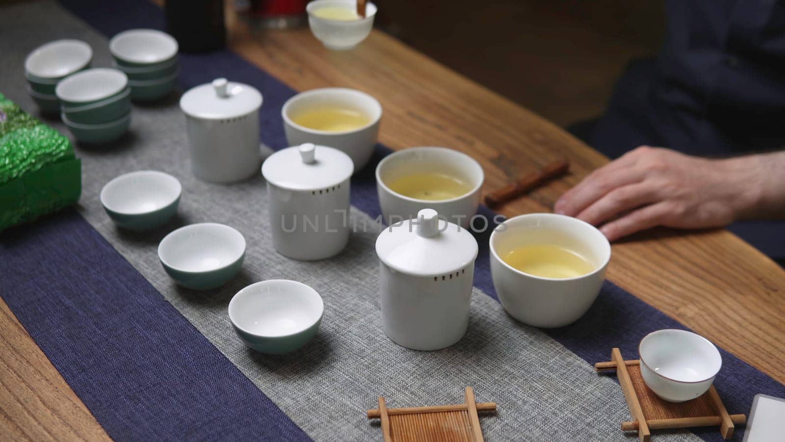 Immerse yourself in the refined elegance of tea brewing with this wonderfully serene and tranquil tea ceremony scene. Media