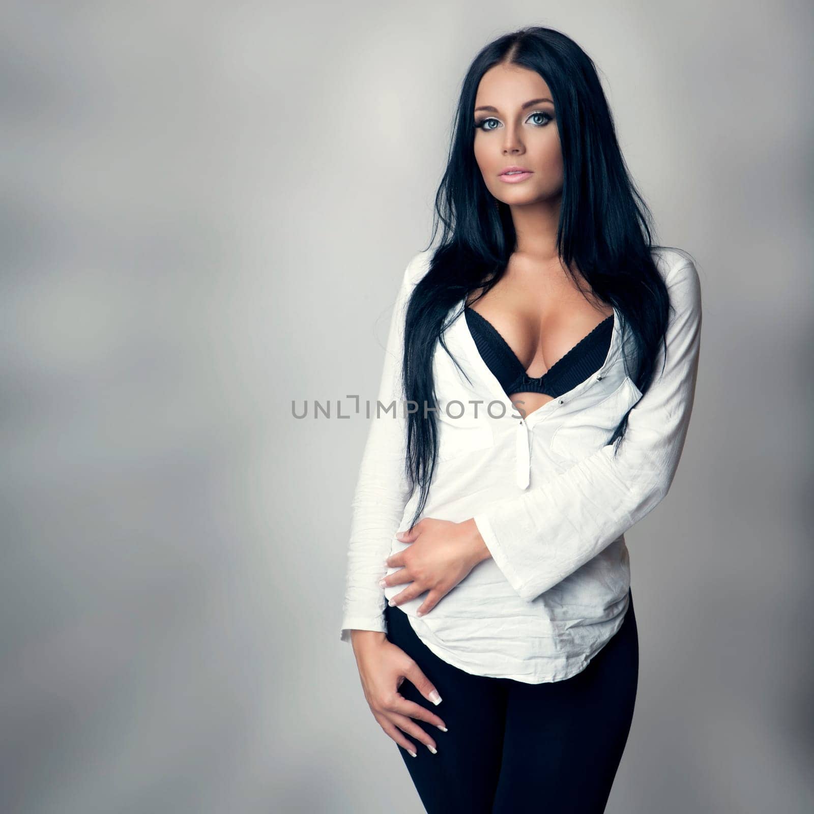 attractive brunette in white shirt and black bra, long hair