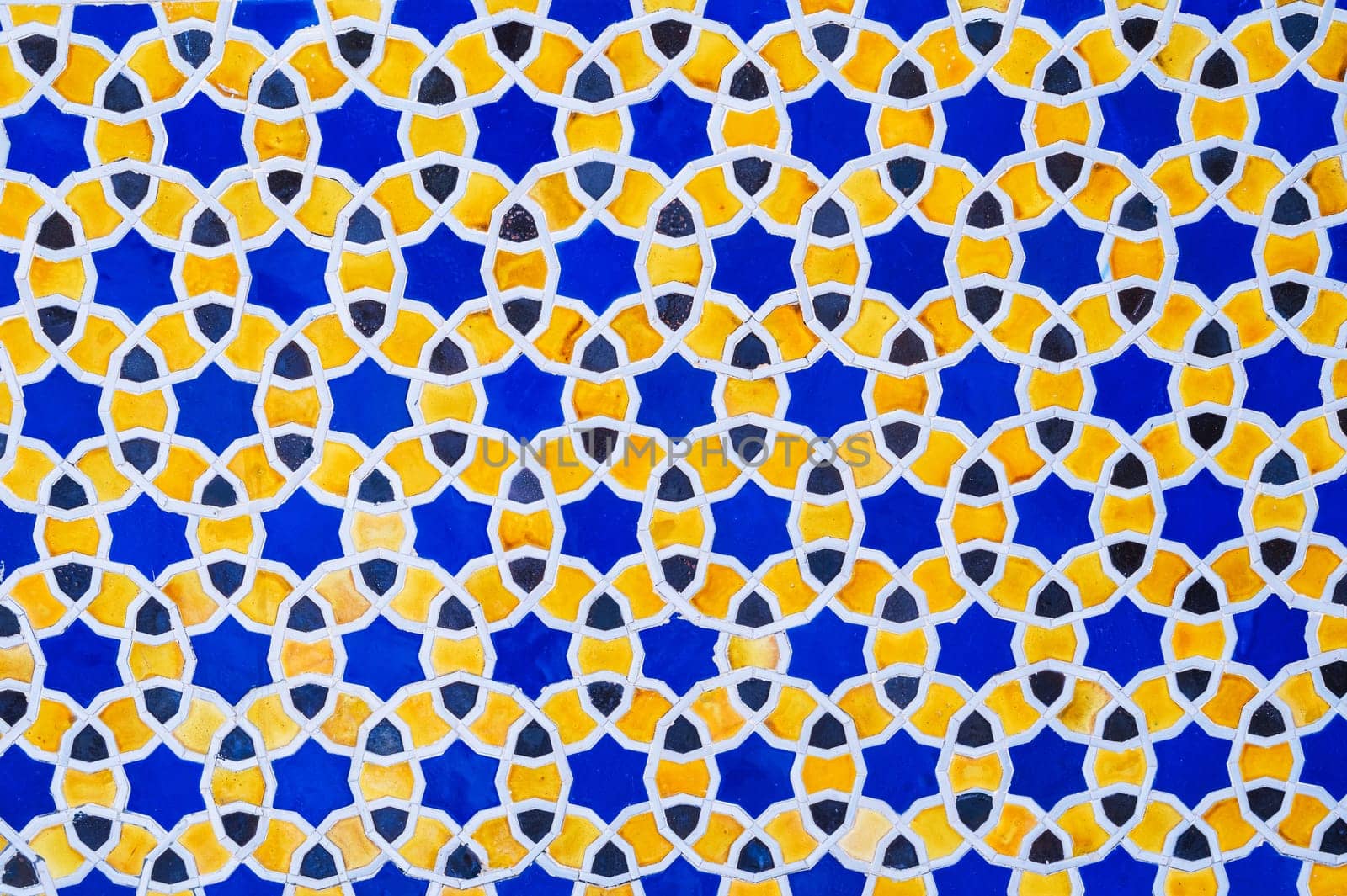 yellow and blue ceramic tiles with an abstract geometric pattern. Background with ornament