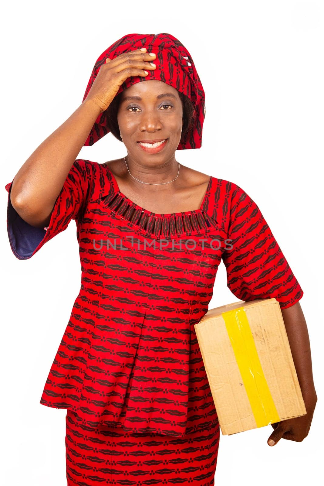 beautiful african adult woman using a mail package making a gesture by putting her hand on her head. on white isolated background