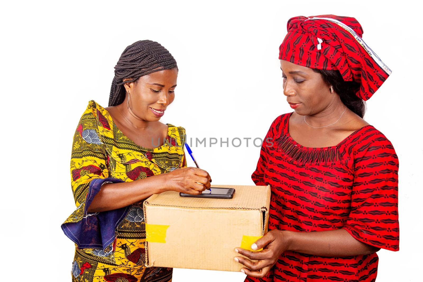 adult delivery service woman in red loincloth and female adult client signing her signature on digital mobile phone receiving mail box package in office